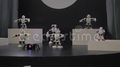 人形机器人舞蹈。 一群可爱的机器人跳舞。 特写智能机器人舞蹈秀.. 4k人体机器人舞蹈